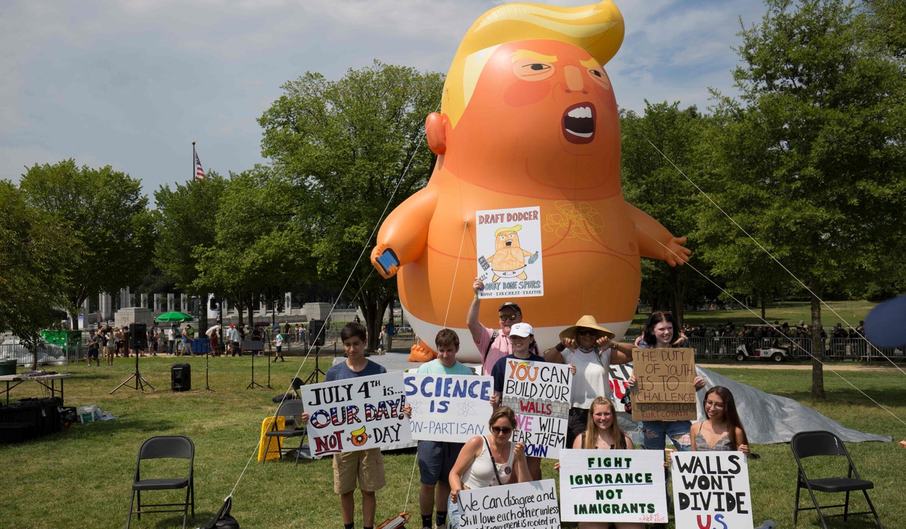 A Trump Baby balloon, set up by members of the CodePink group, is seen ahead of the Salute to America event in Washington on Thursday. Photo: AFP