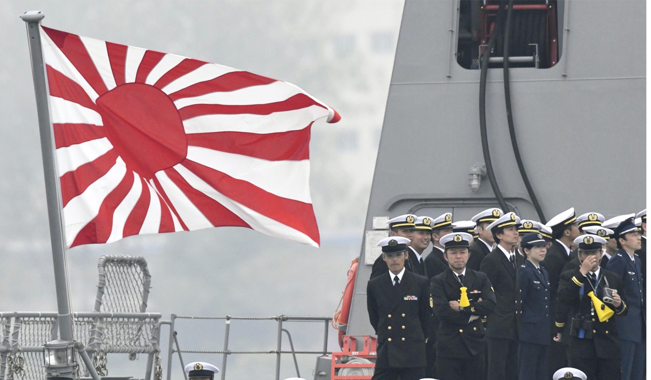 Japan’s rising sun naval ensign has been another source of tension between it and South Korea. Photo: Kyodo