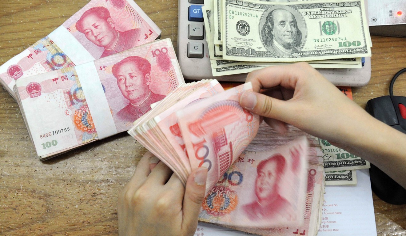 In addition to the US$50,000 foreign exchange cap, Chinese citizens are finding it increasingly difficult to buy foreign currencies at home. Photo: AFP