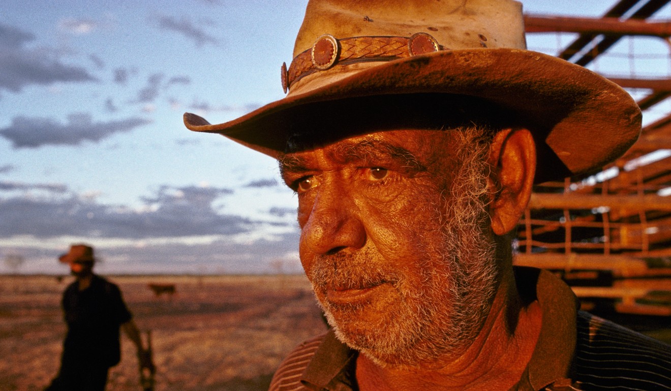 Aboriginal stockman in Australia wearing a traditional outback hat. Photo: Alamy