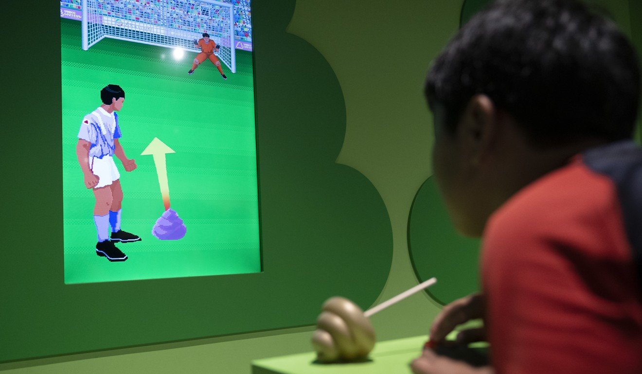 A young boy plays a video game at the Unko Museum in Yokohama, south of Tokyo. Photo: AP