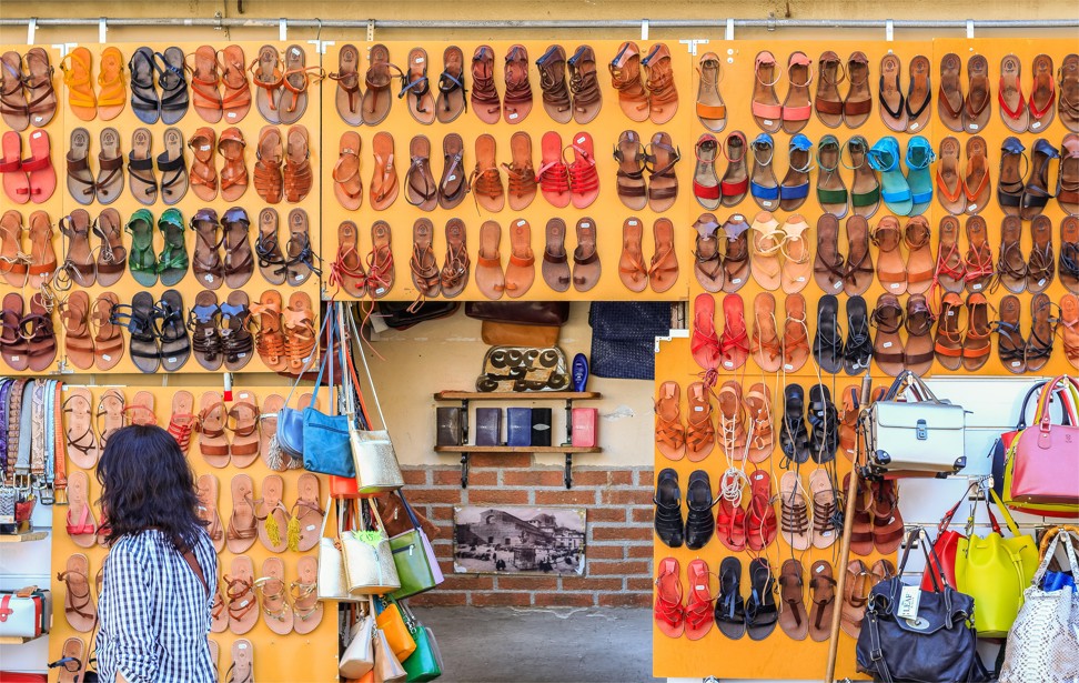 Leather sandals for sale at the San Lorenzo market. Photo: Alamy