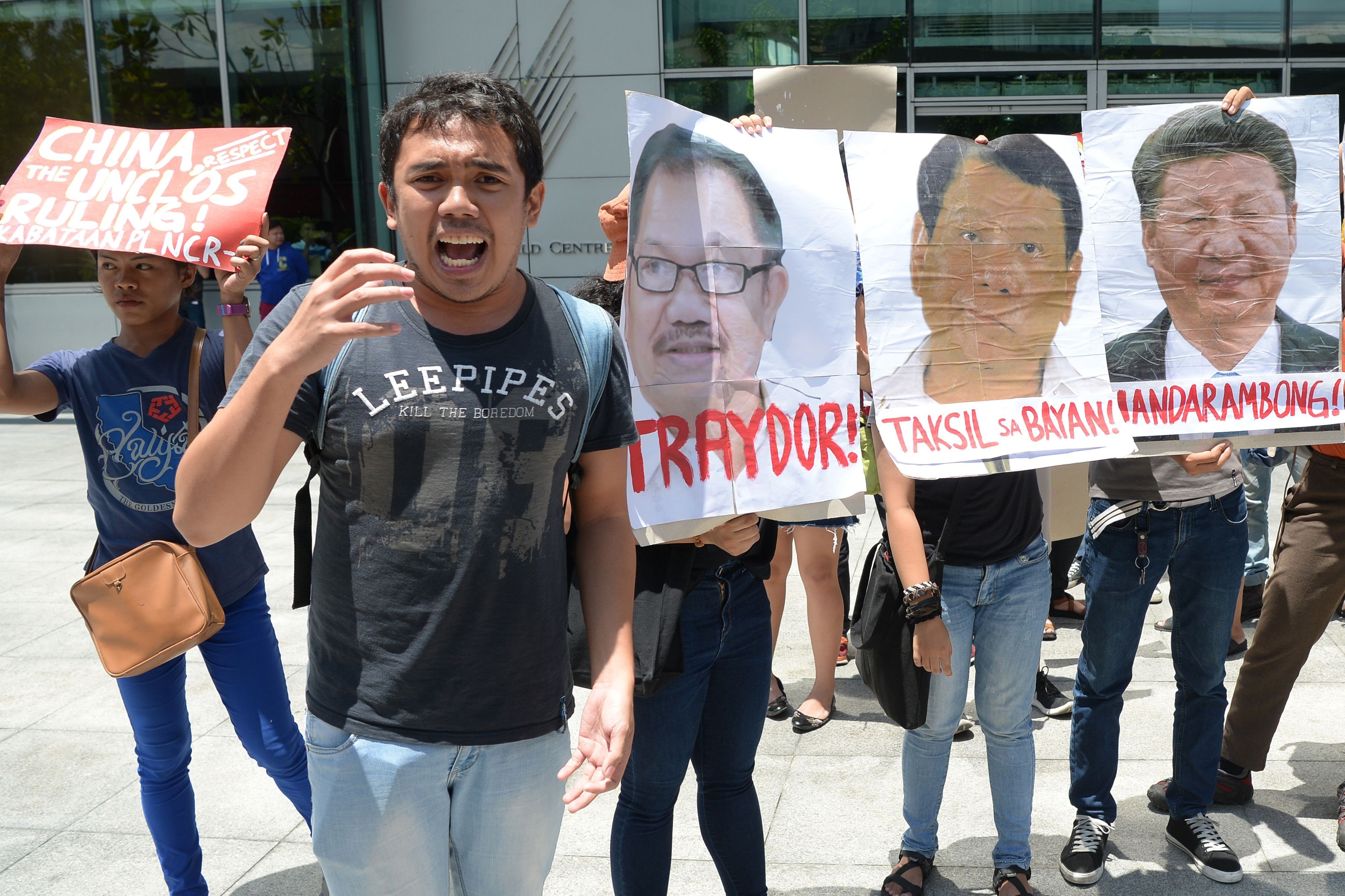 People protest outside the Chinese consulate in Manila last month after a Chinese vessel rammed a Philippine fishing boat. Photo: AFP