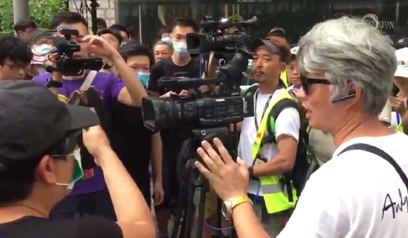 A TVB cameraman surrounded by protesters at an extradition bill rally on June 27. Photo: Alvin Lum