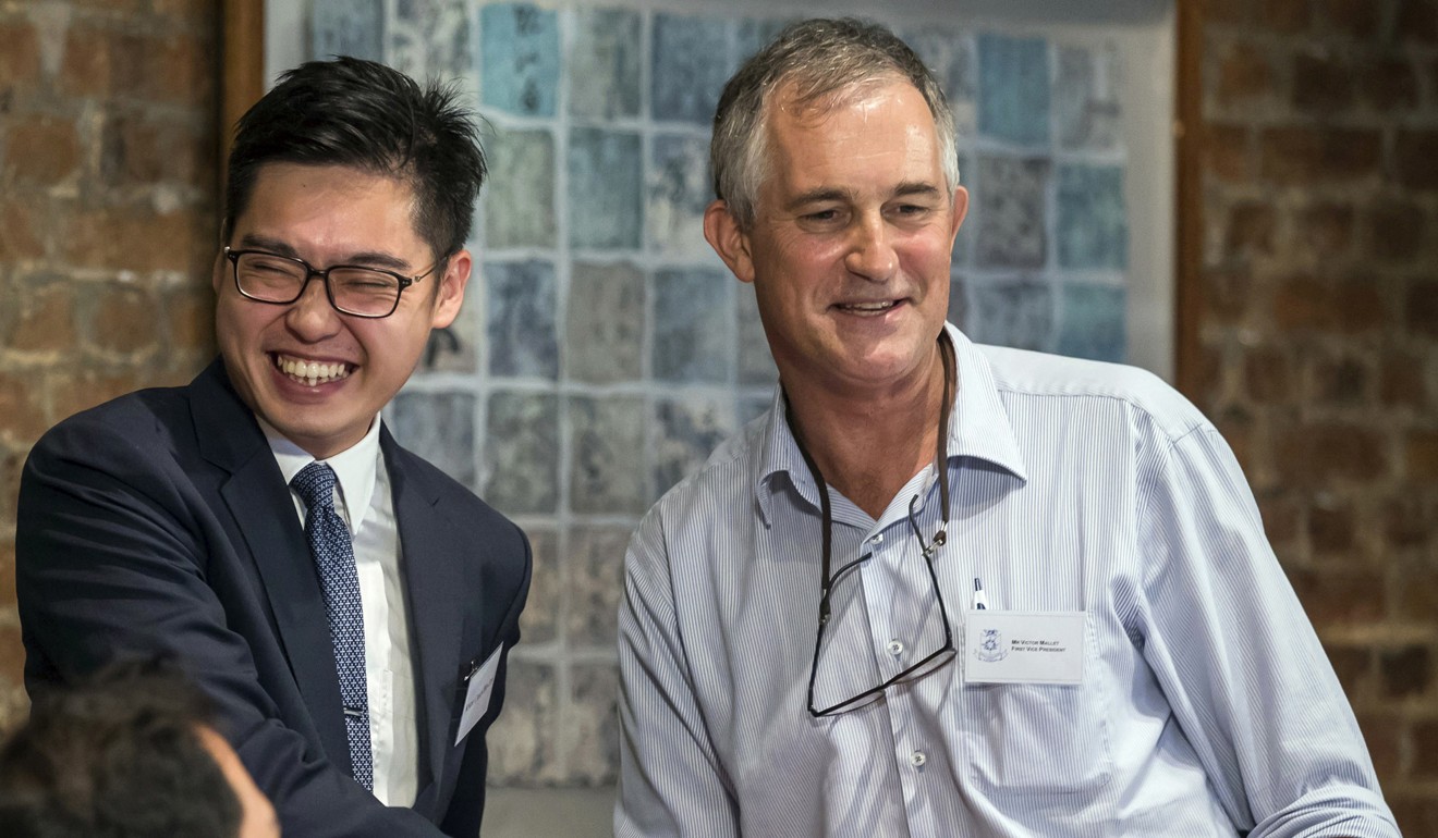 Victor Mallet (right), the Financial Times’ former Asia news editor, meets Andy Chan, founder of the Hong Kong National Party, during a luncheon last year at the Foreign Correspondents Club in Hong Kong, before his visa renewal was rejected. Photo: AP