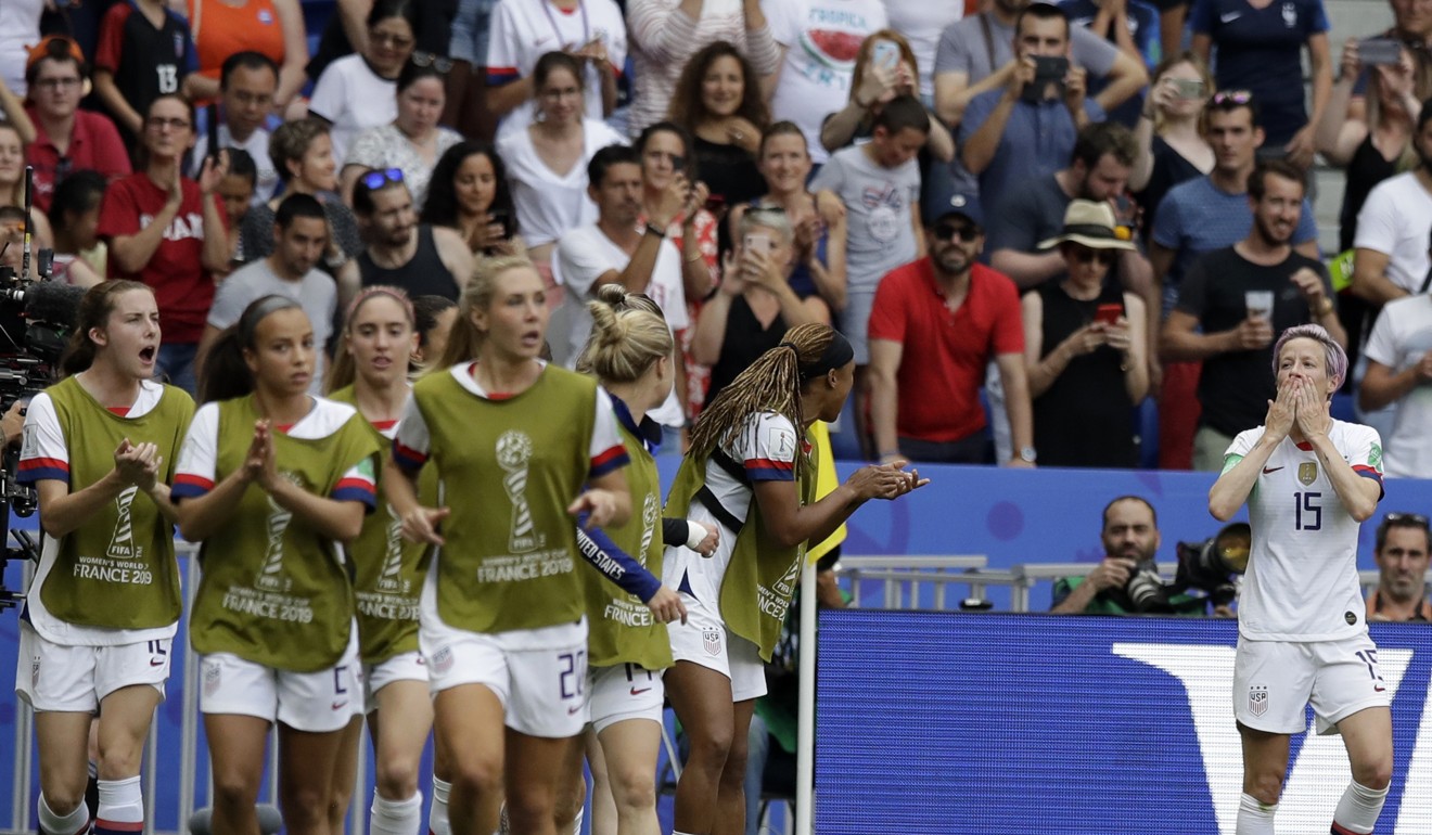 Rapinoe celebrates with the US substitutes. Photo: AP
