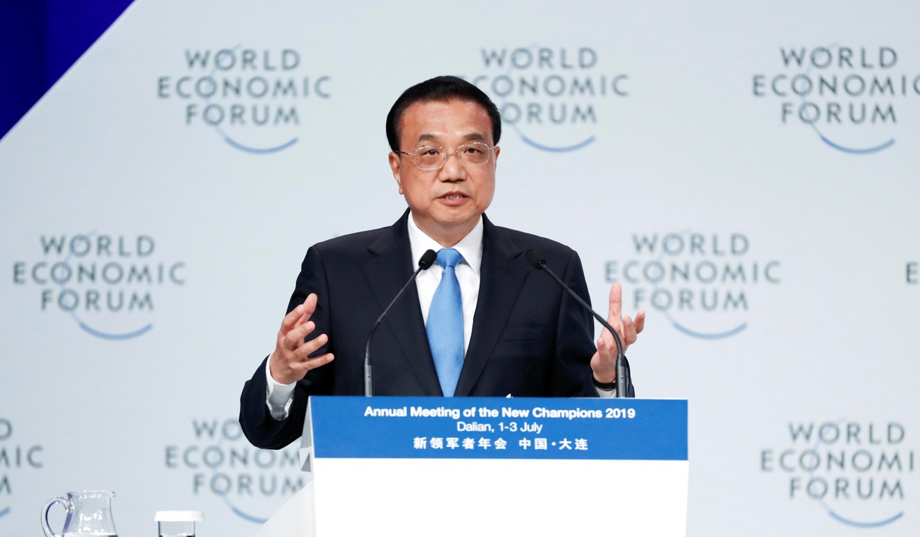 Chinese Premier Li Keqiang at the opening ceremony of the Summer Davos Forum, in Dalian on July 2, 2019. China is scrapping foreign ownership caps in its financial industry from 2020, a year ahead of schedule. Photo: CNS via Reuters