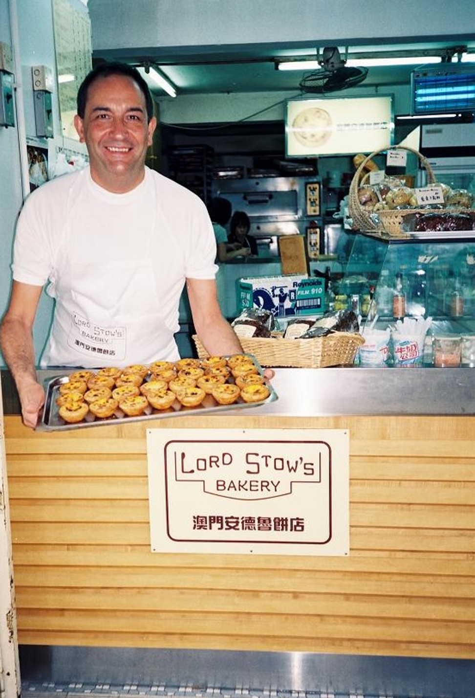 Andrew Stow with egg tarts created using his own recipe.