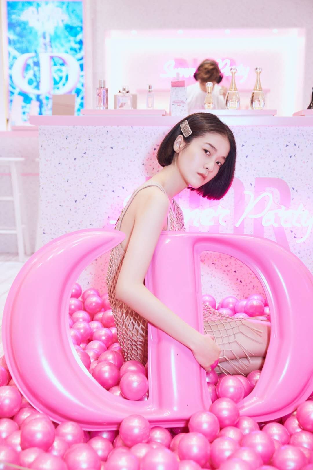 China’s Dior ambassador, actress Sophie Zhang, at the pool at the summer party celebrating the opening of Dior’s pop-up store in Macau.