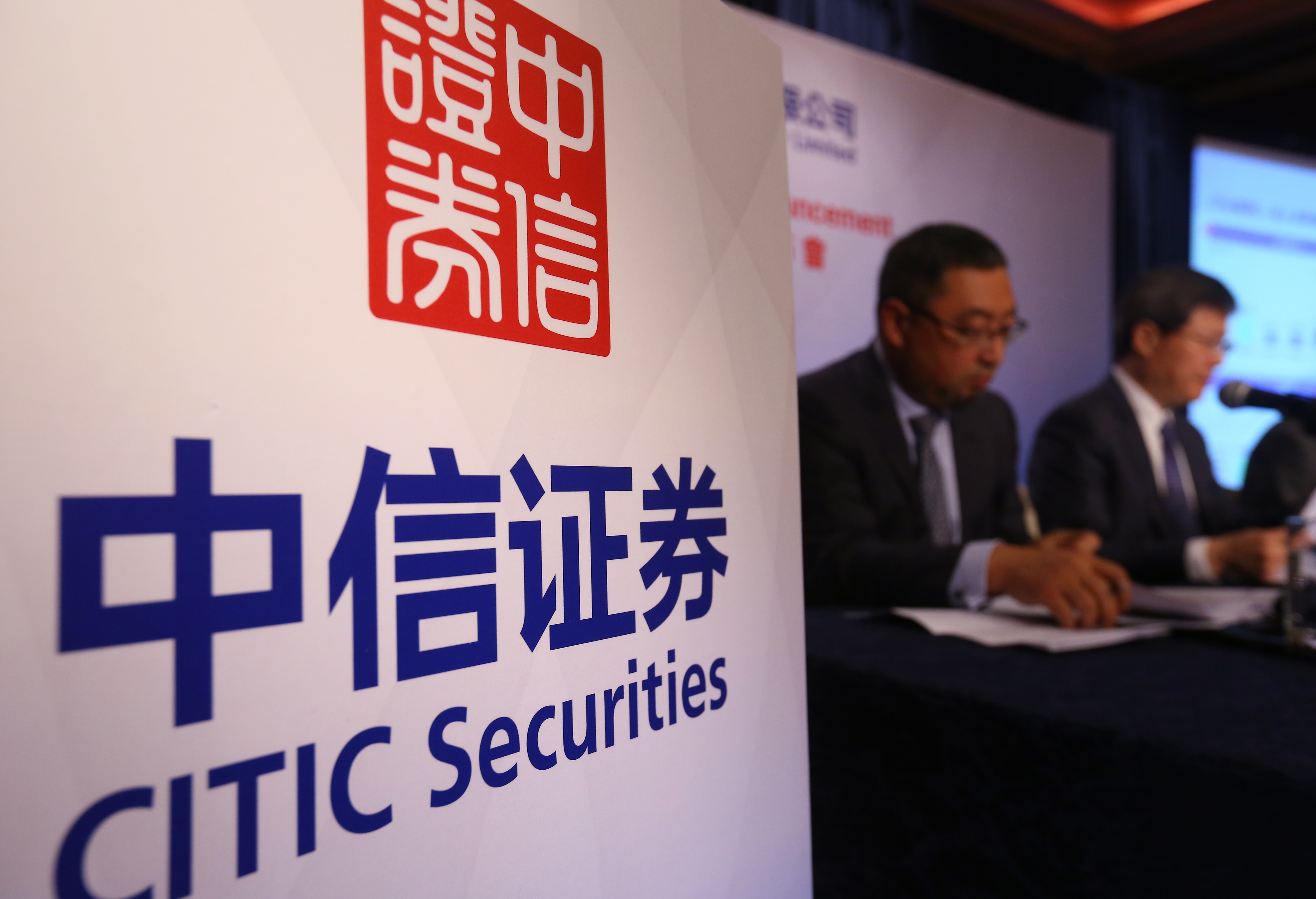 Citic Securities (L to R) Head of Brokerage – International David Shang and Chairman Zhang Youjun during a press conference in Admiralty on 24 March 2016. Photo: SCMP/Edmond So