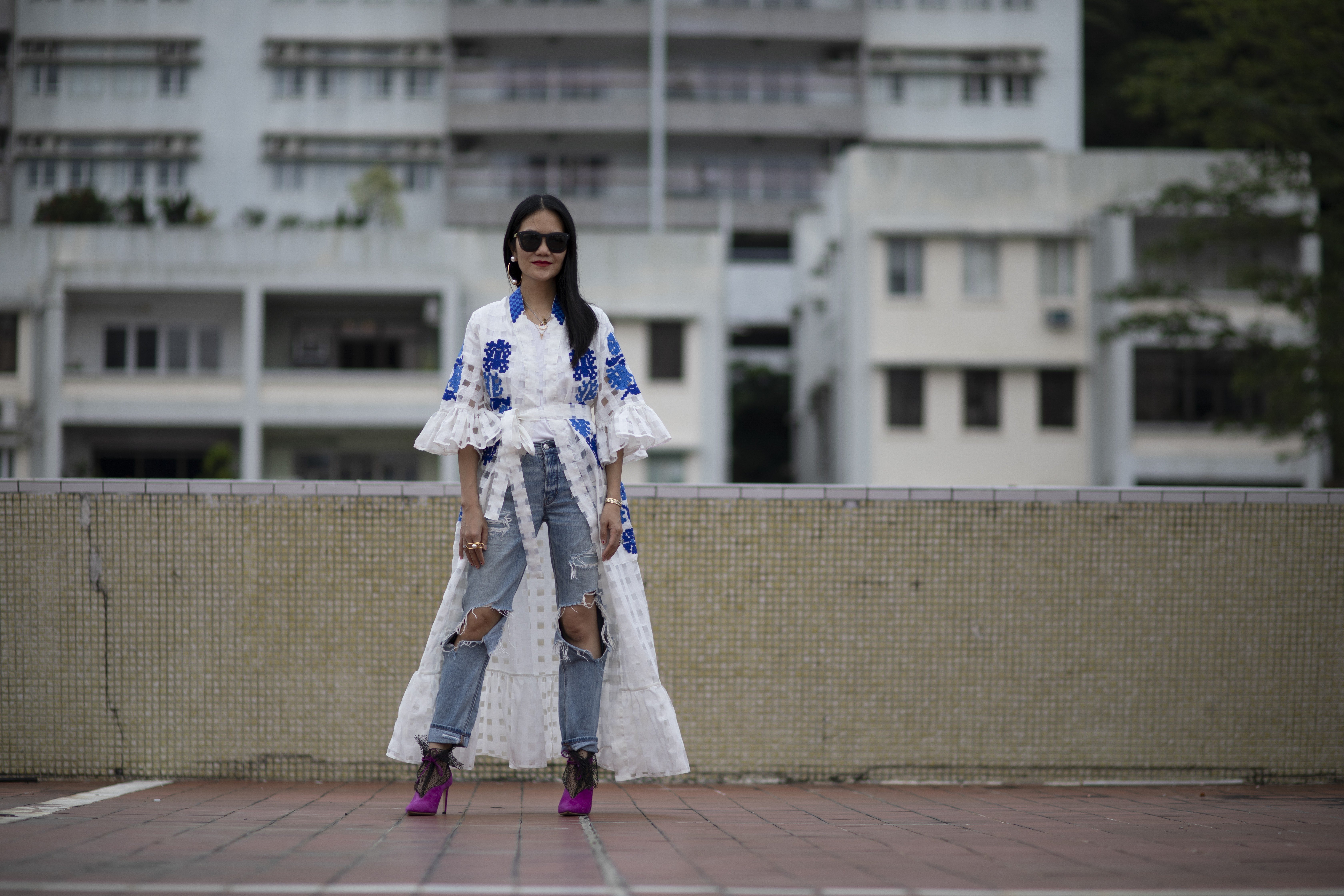 Grace Lam sports a coat dress by March 11, a white T-shirt by Muji, denim pants by American Eagle Outfitters, heels by Jimmy Choo and sunglasses by Grey Ant. Photo: Antony Dickson