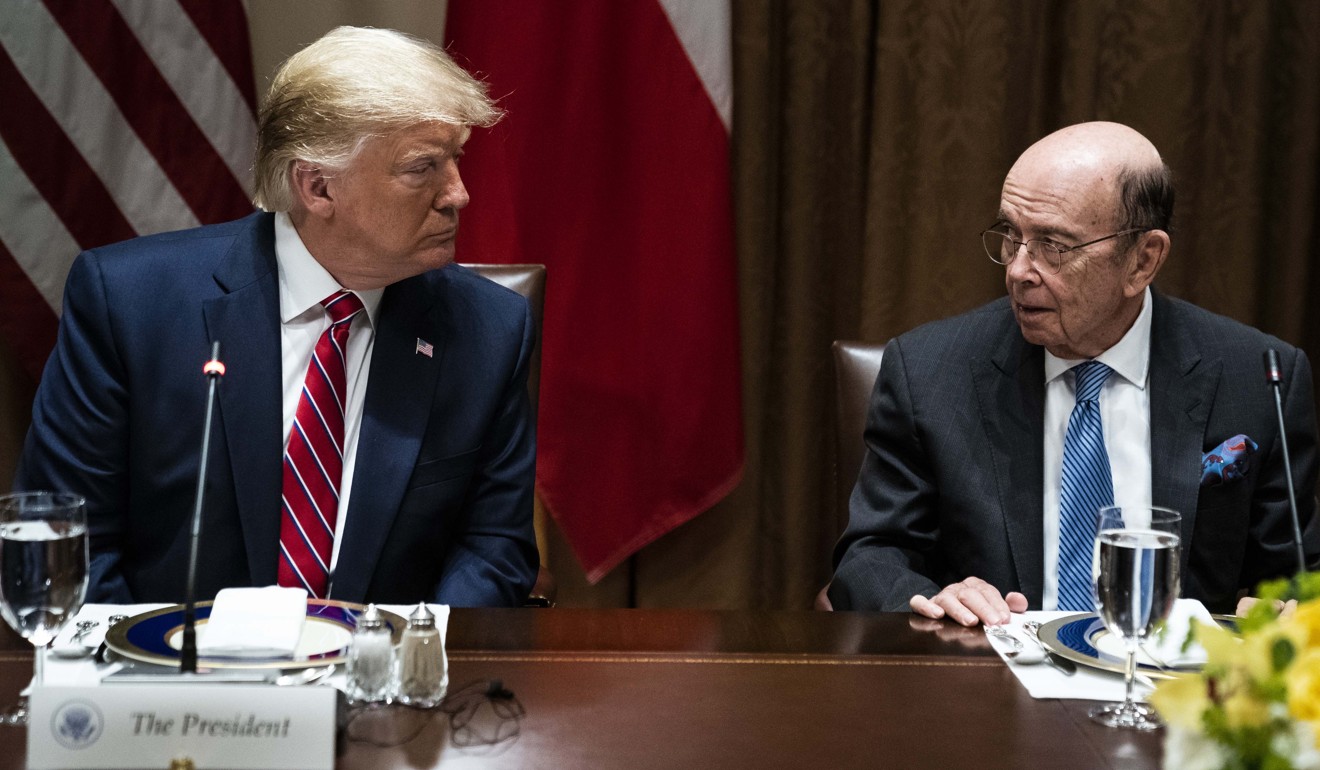 US President Donald Trump confers with Commerce Secretary Wilbur Ross last month. Photo: Jabin Botsford/Washington Post