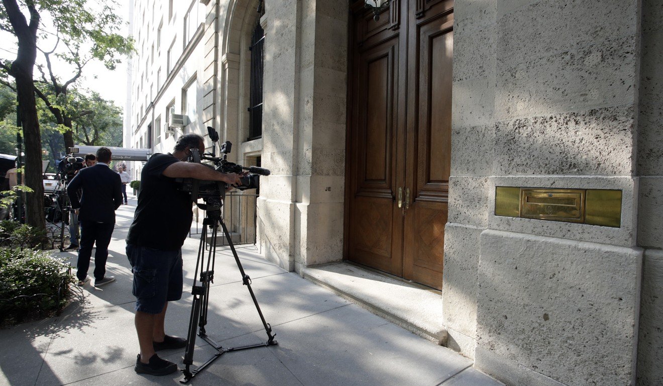 Members of the international media outside US financier Jeffrey Epstein’s mansion in New York on Monday. Photo: EPA-EFE