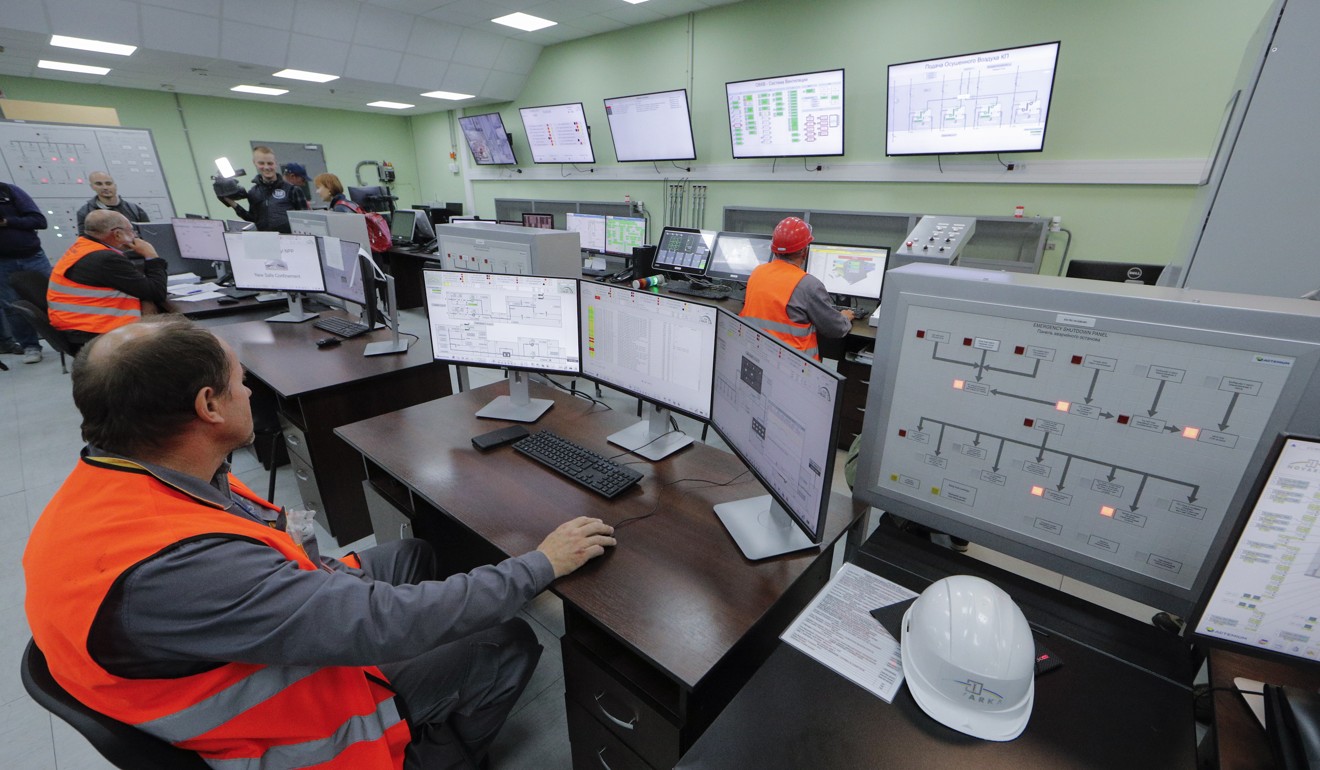 Workers operate in the control centre of the new safe confinement structure in Chernobyl, Ukraine, on Wednesday. Photo: EPA-EFE