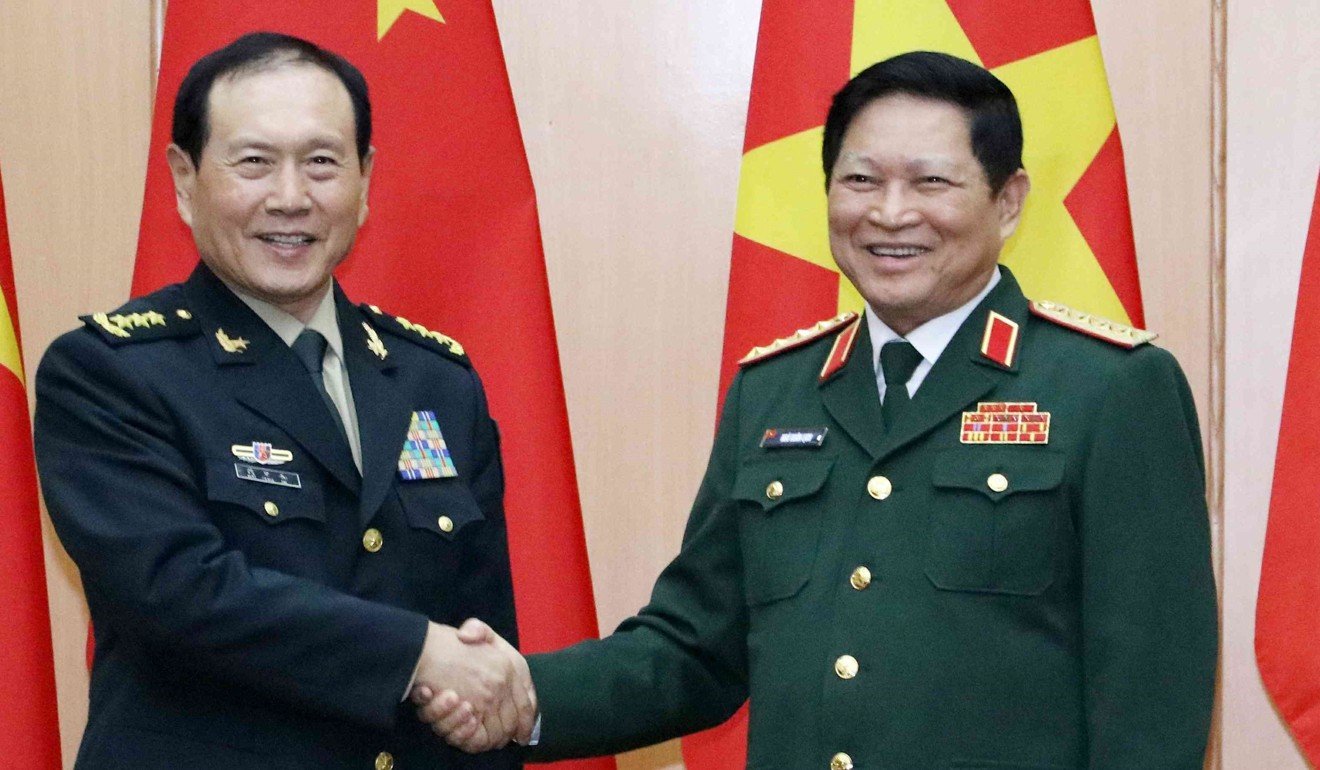 Chinese Defence Minister General Wei Fenghe (left) and Vietnamese counterpart General Ngo Xuan Lich discussed the South China Sea during talks in Hanoi in May. Photo: Handout