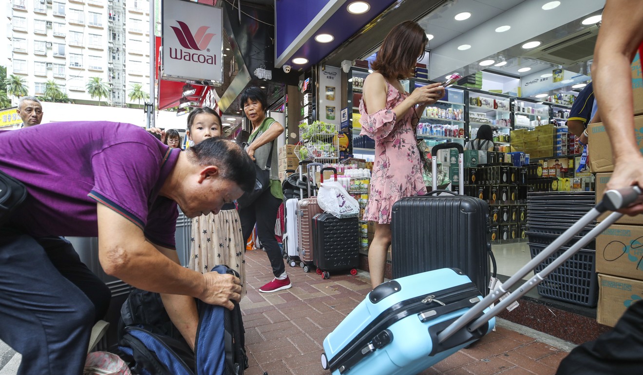 Mainland tourists shopping in Sheung Shui. Photo: Winson Wong