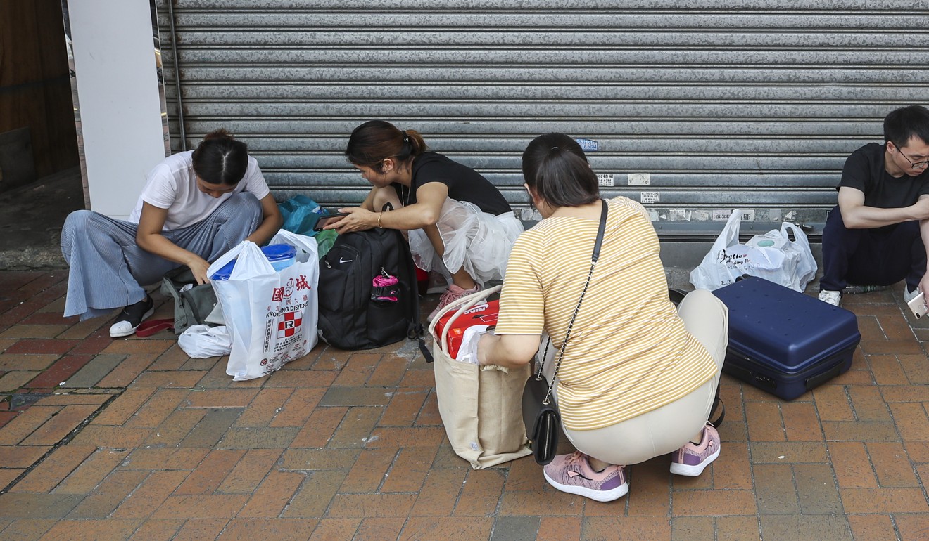 Mainland tourists stocking up on provisions in Sheung Shui. Photo: Winson Wong