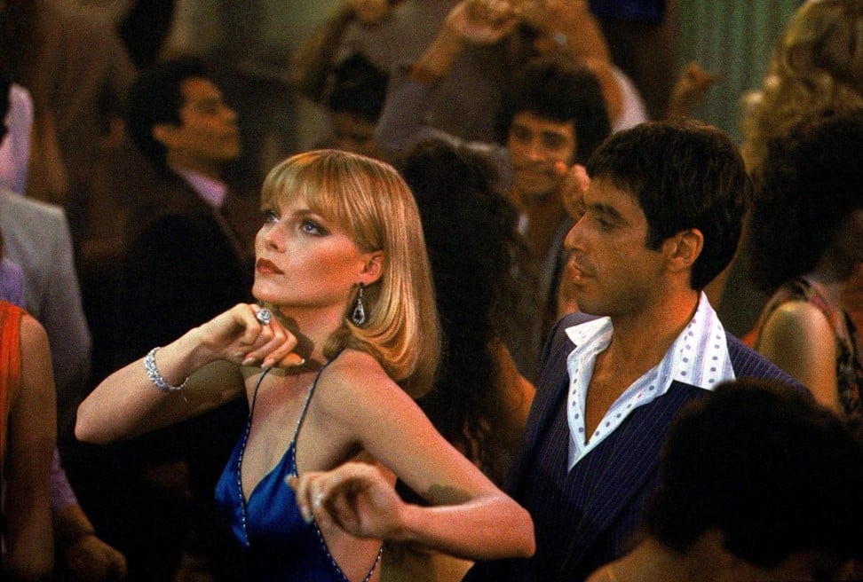 Michelle Pfeiffer with Pacino in Scarface (1983).