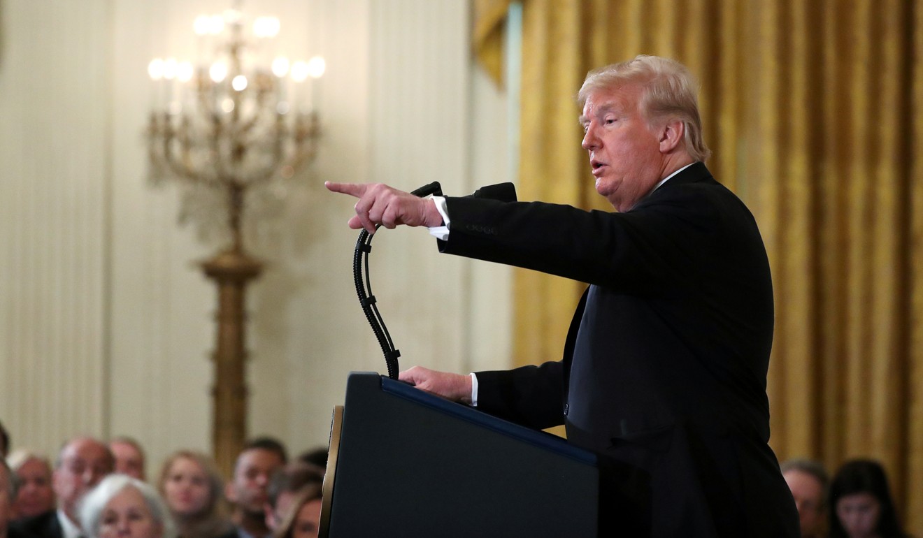 US President Donald Trump points during a news conference at the White House in November. Photo: Reuters