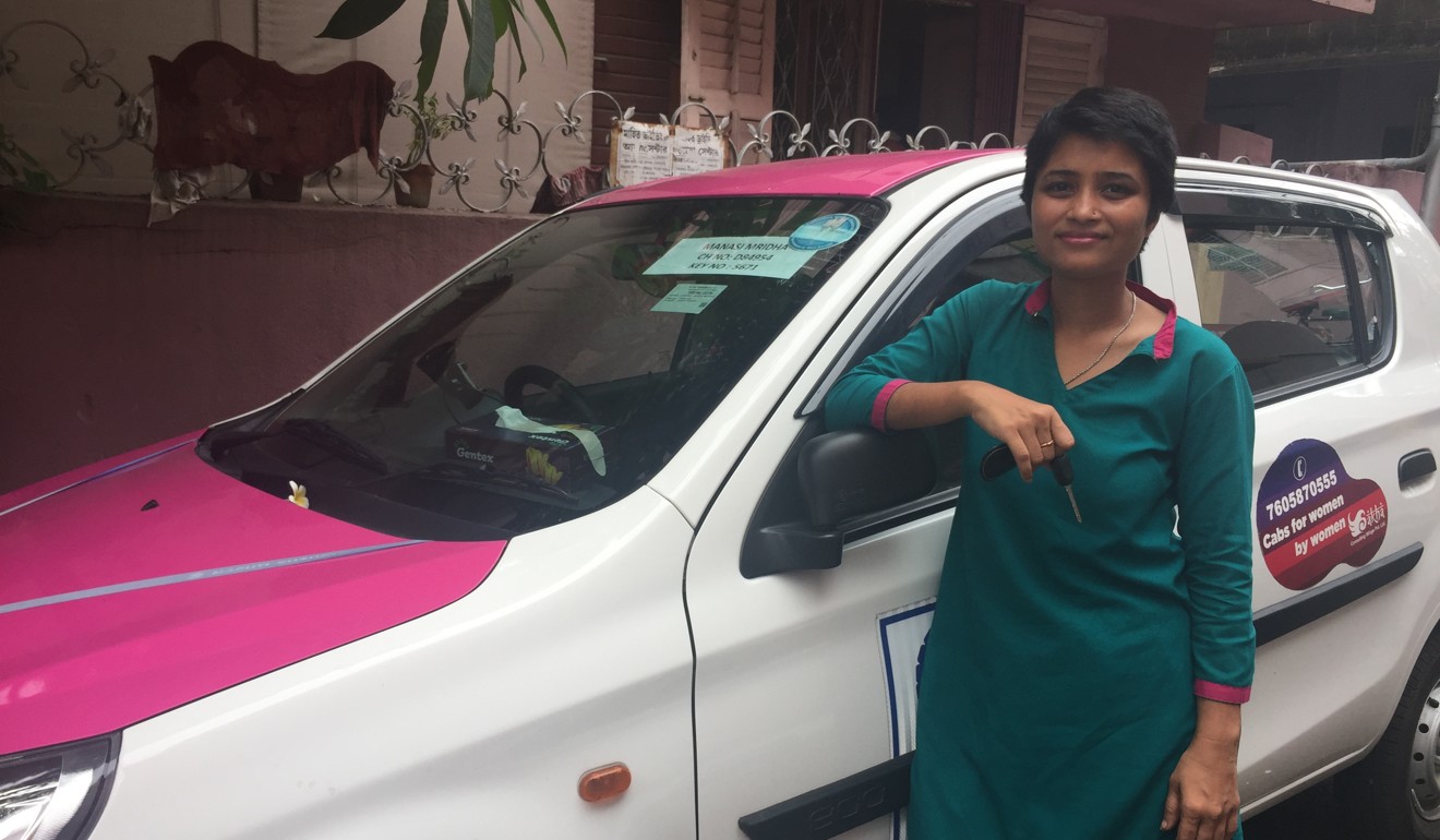Manasi Mridha with her ‘pink cab’ in Kolkata. Photo: Sarita Santoshini