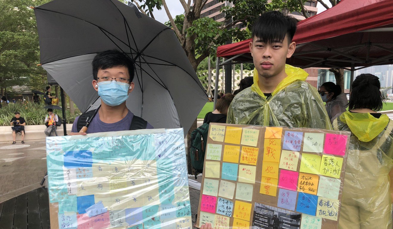 Students Isaac Pang and Samuel Chu have managed Lennon Walls, displaying messages of support for extradition bill protesters, in Wong Tai sin and Tai Po respectively. Photo: Jeffie Lam