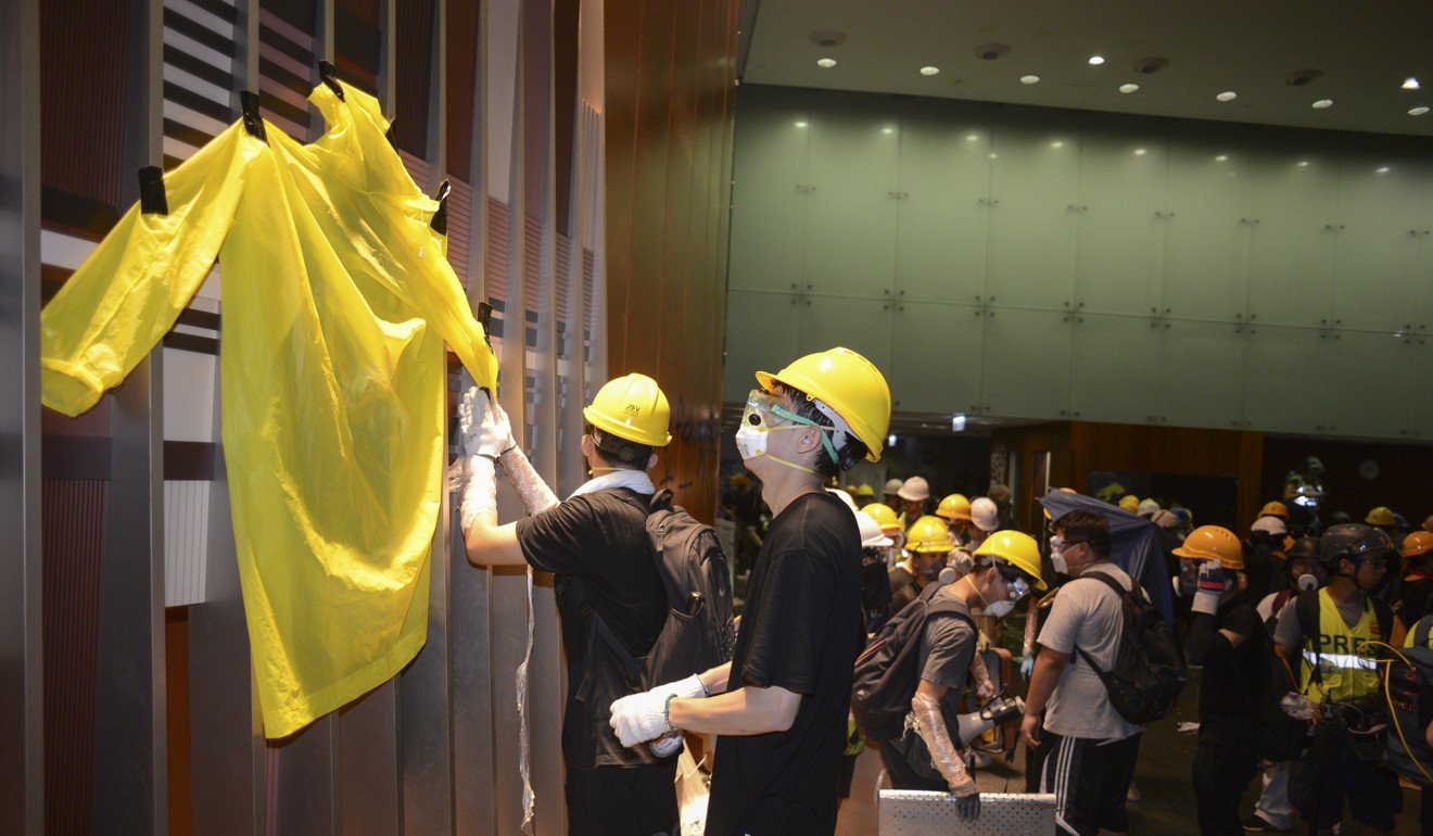 A yellow raincoat to pay respect to a protester who fell to his death during Hong Kong’s extradition bill protests. Photo: Antony Dickson