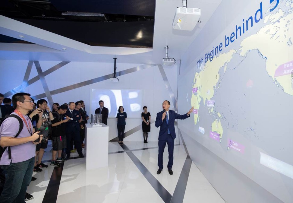 PCCW Global chief commercial officer Frederick Chui presenting to visitors of HKT 5G Tech Carnival the ins and outs of the global fifth-generation mobile network.