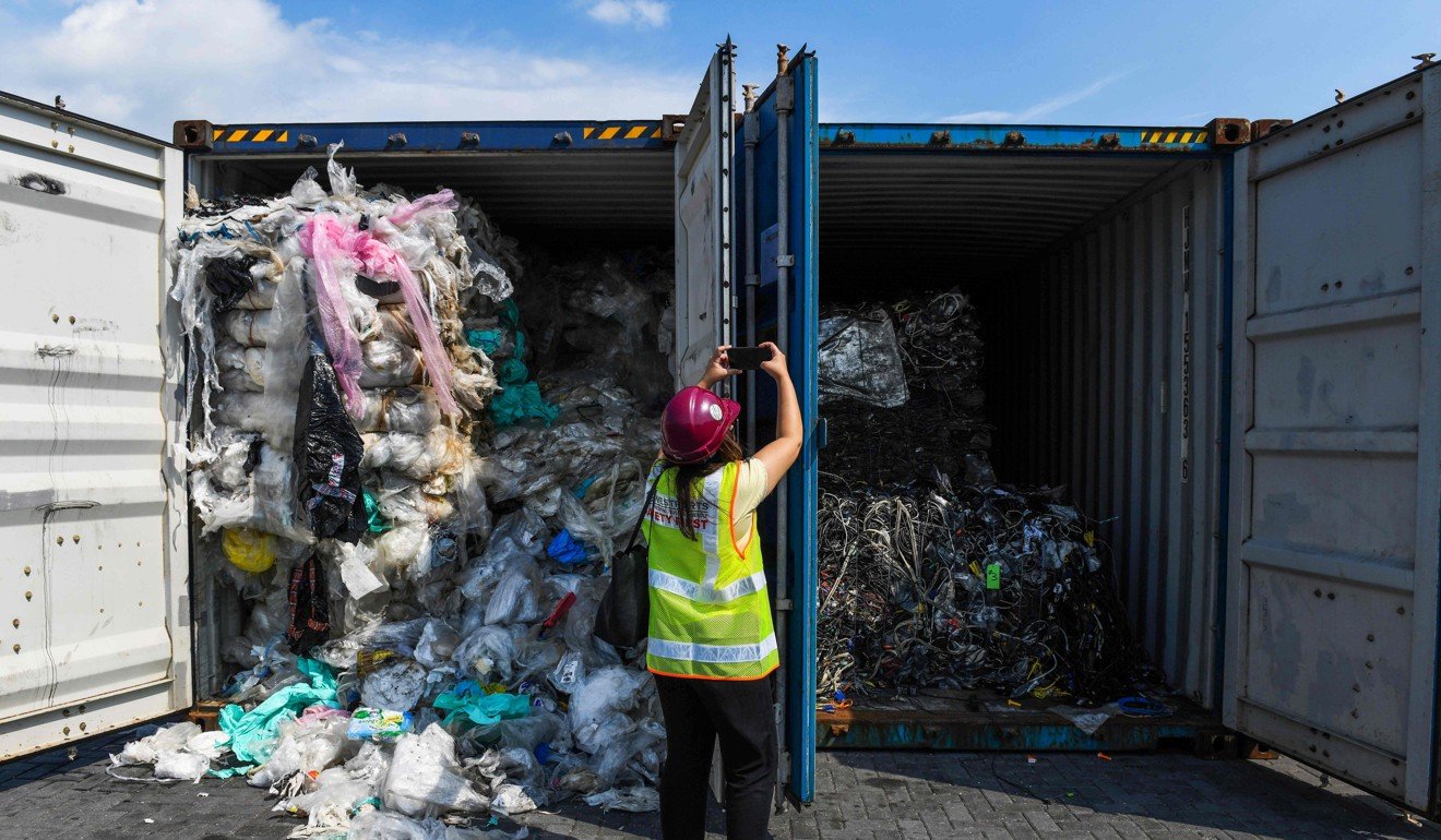 Sorting trash can be an unpleasant job, one reason why a lot of rubbish ends up in developing countries with lower wages. Photo: AFP