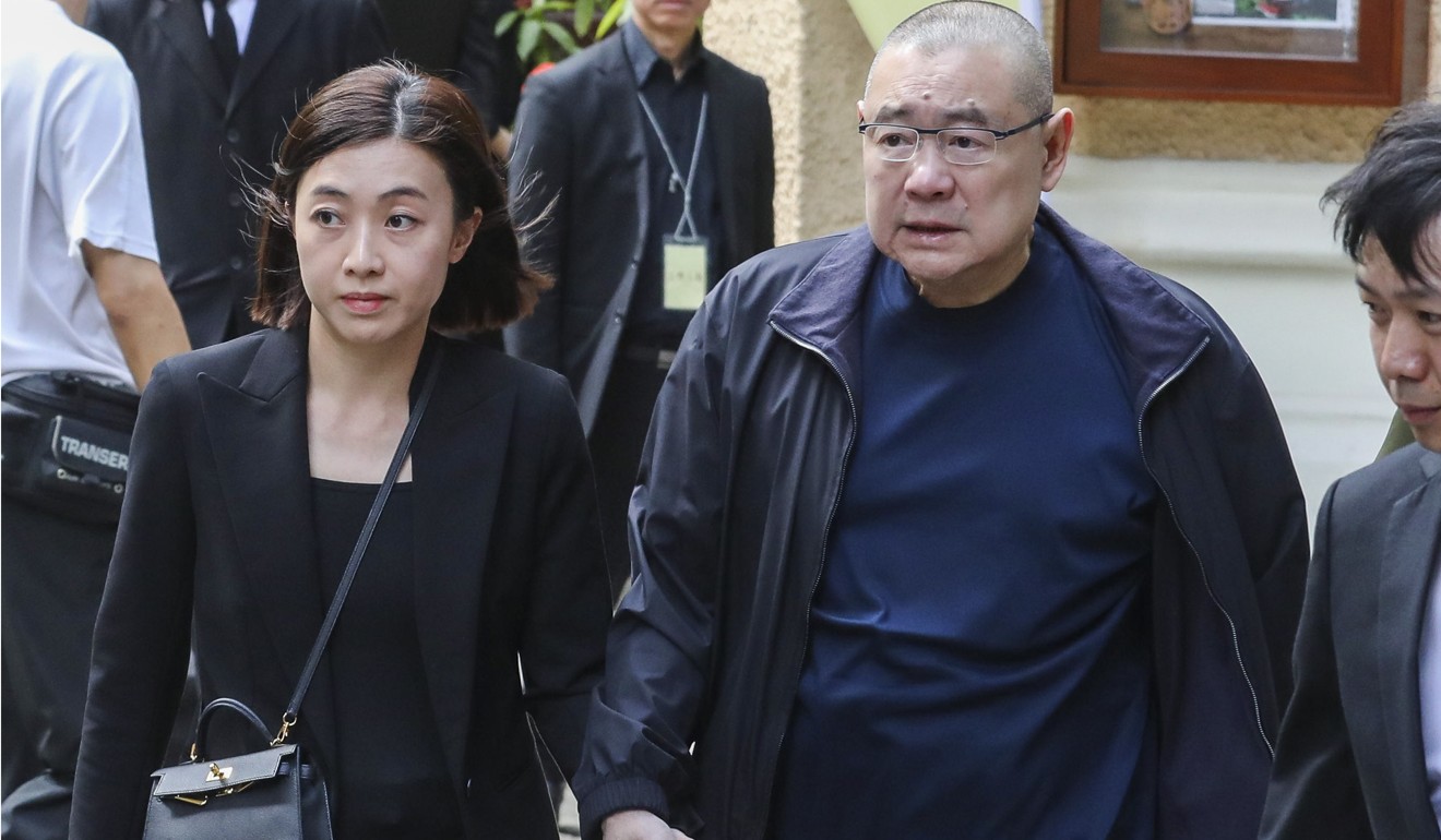 Joseph Lau (right) and his wife Chan Hoi-wan (left) attend real estate tycoon Walter Kwok Ping-sheung's funeral service on November 1, 2018. Photo: Felix Wong
