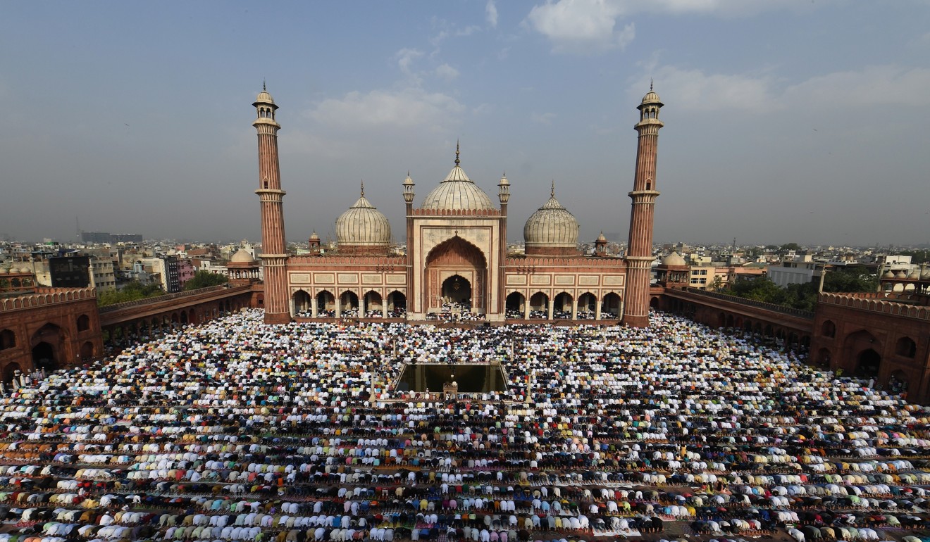 Indian Muslims offer prayers during Eid al-Fitr at the Jama Masjid mosque in New Delhi last month. Experts say the total absence of laws to regulate Islamic finance often leads to Ponzi schemes. Photo: AFP
