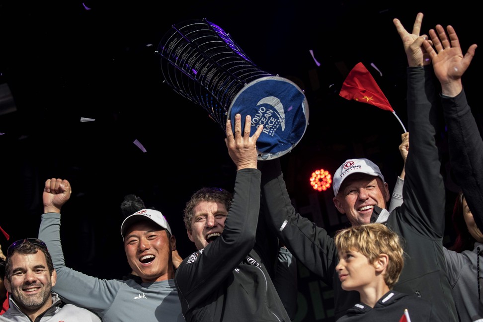 French skipper Charles Caudrelier (centre) and his Dongfeng Race Team celebrate their victory at The Hague. Photo: AFP