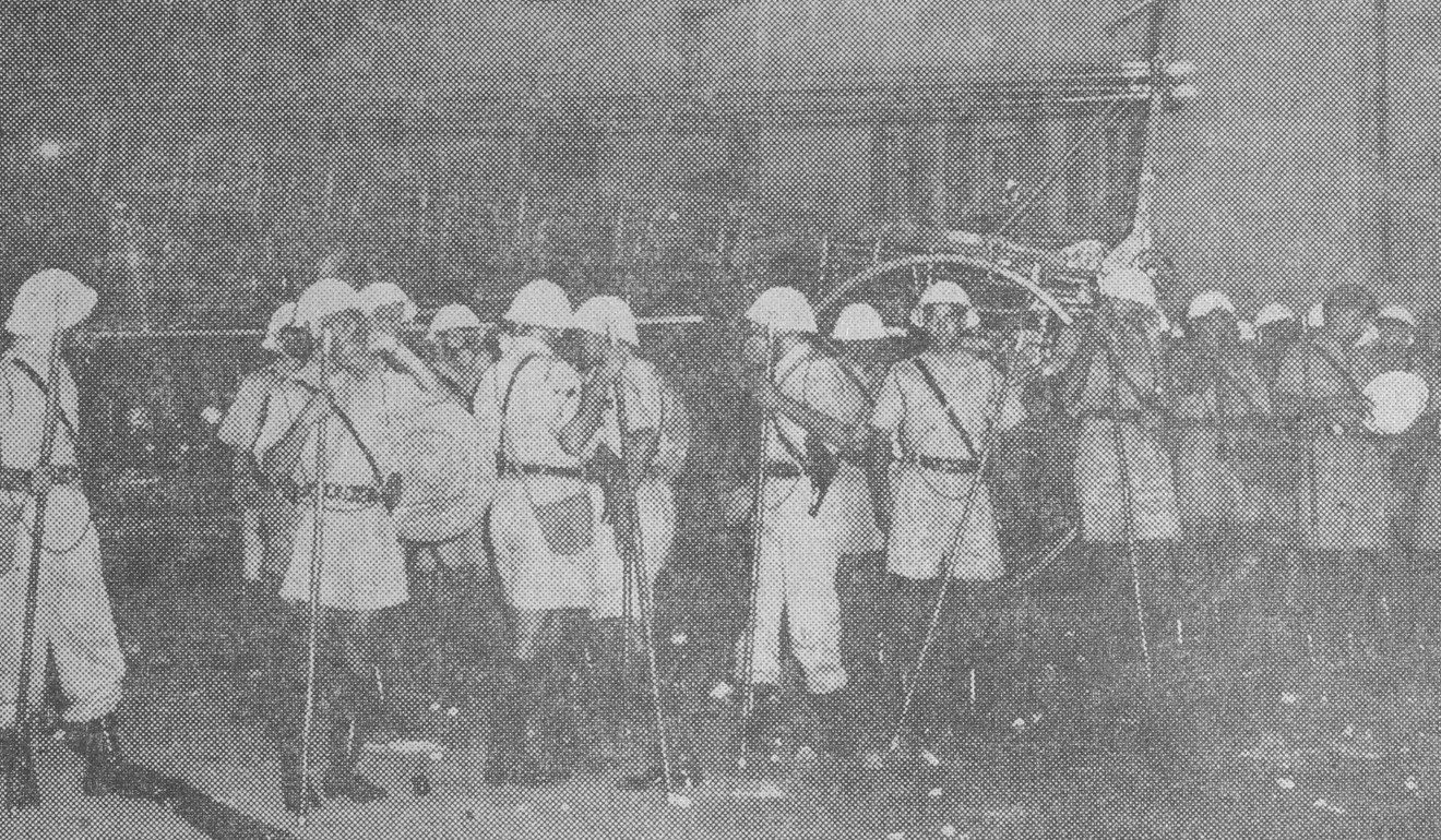 Members of the Pakistan contingent of the Hong Kong Police attend to the 1956 Double Tenth Riots. Photo: Post Magazine