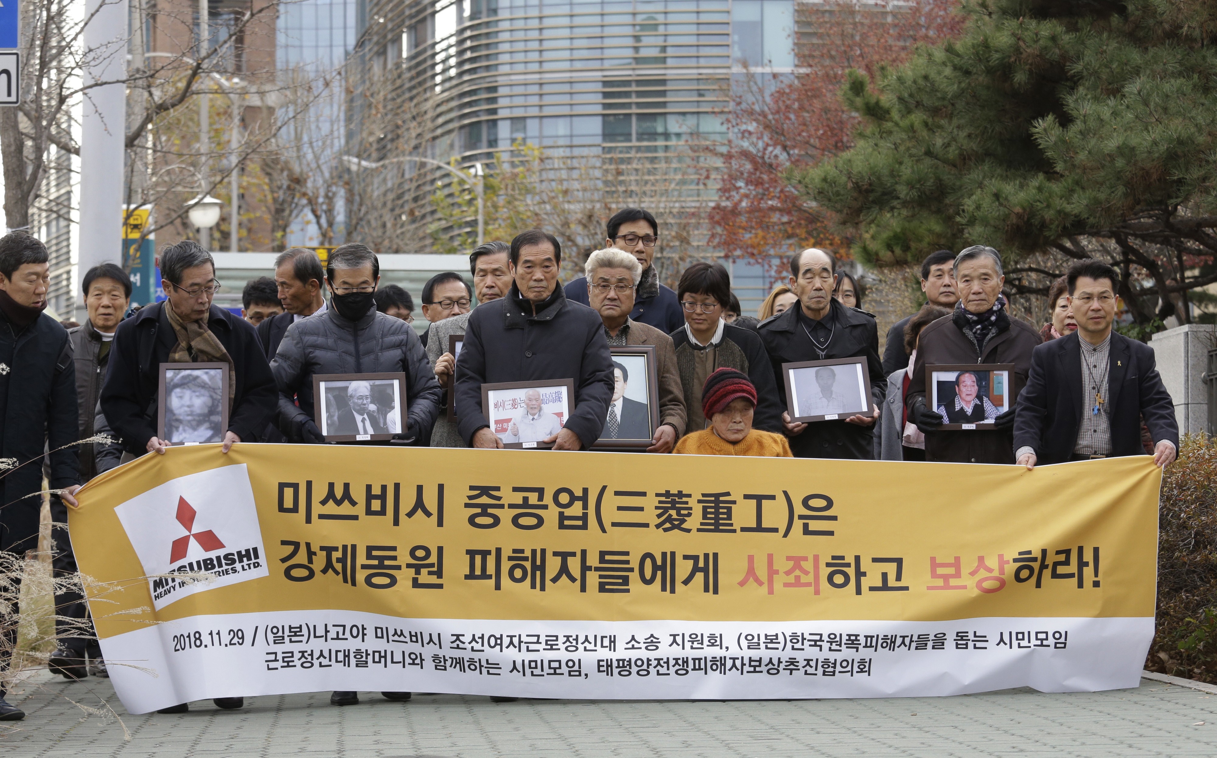 Victims of Japan’s forced labour and their family members arrive at the Supreme Court in Seoul in January 2019. Photo: AP