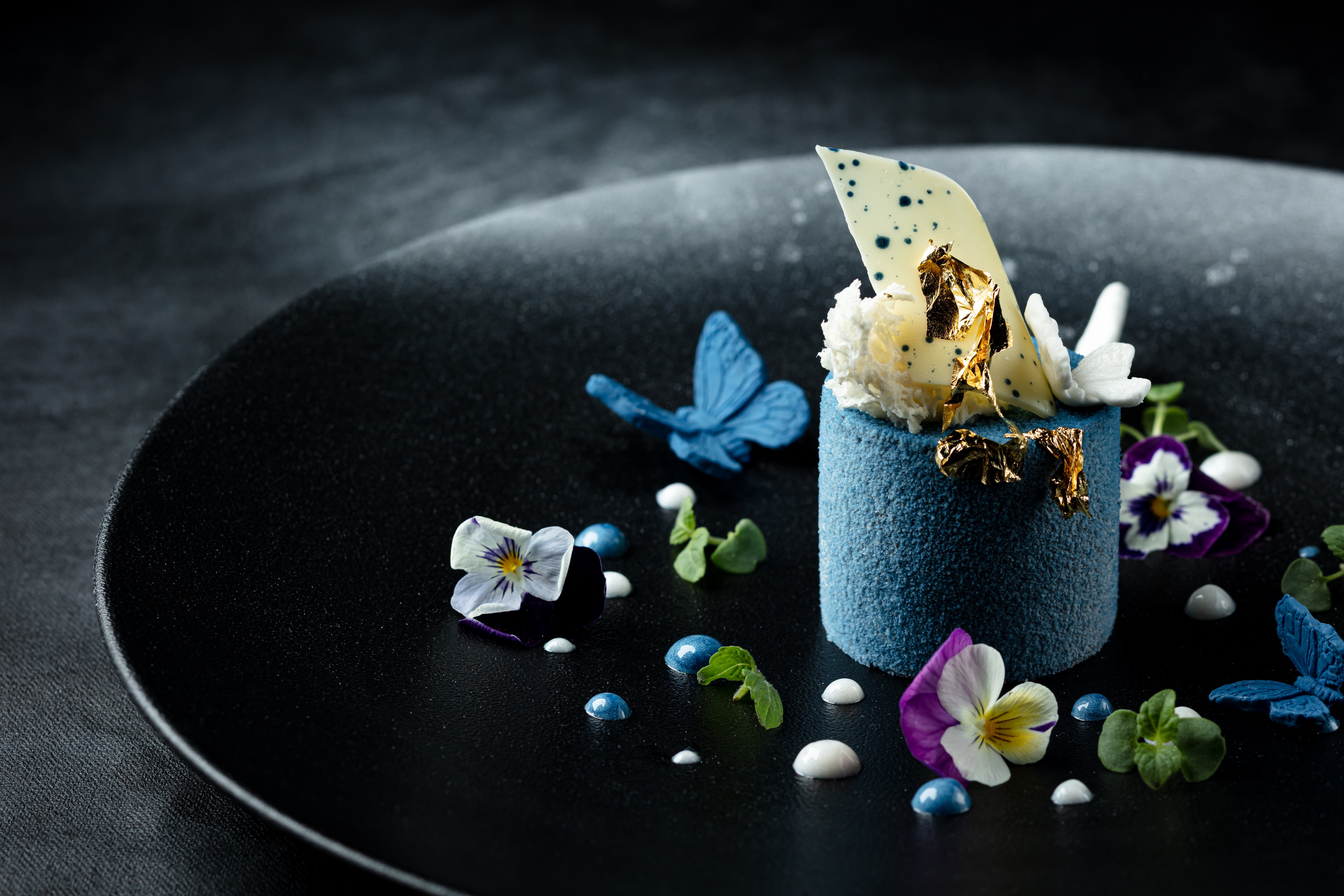 The Golden Peacock’s Prosperity comprises blueberry, hazelnut chocolate mousse, yogurt, cardamom, cherry and gold leaf.