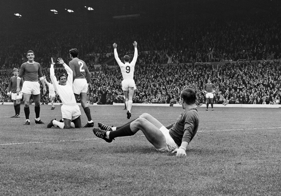 Paul Madeley turns away in celebration after scoring for Leeds against Manchester United in 1966. Photo: Alamy