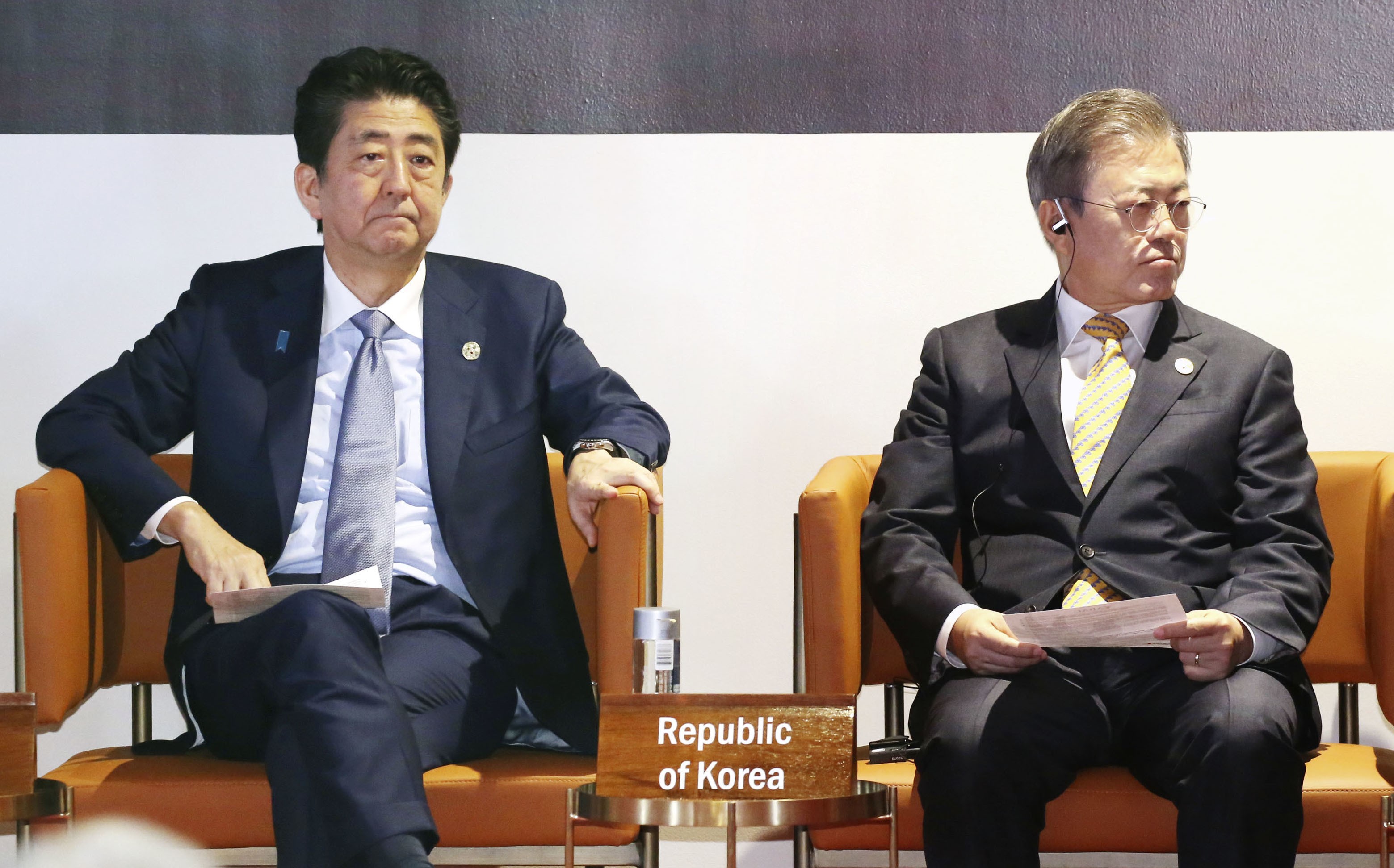 Japanese Prime Minister Shinzo Abe and South Korean President Moon Jae-in attend an event on the sidelines of the Asia-Pacific Economic Cooperation forum summit in Papua New Guinea in November 2018. Under the conservative Abe and progressive Moon, relations between Japan and South Korea have reached their lowest point in decades. Photo: Kyodo