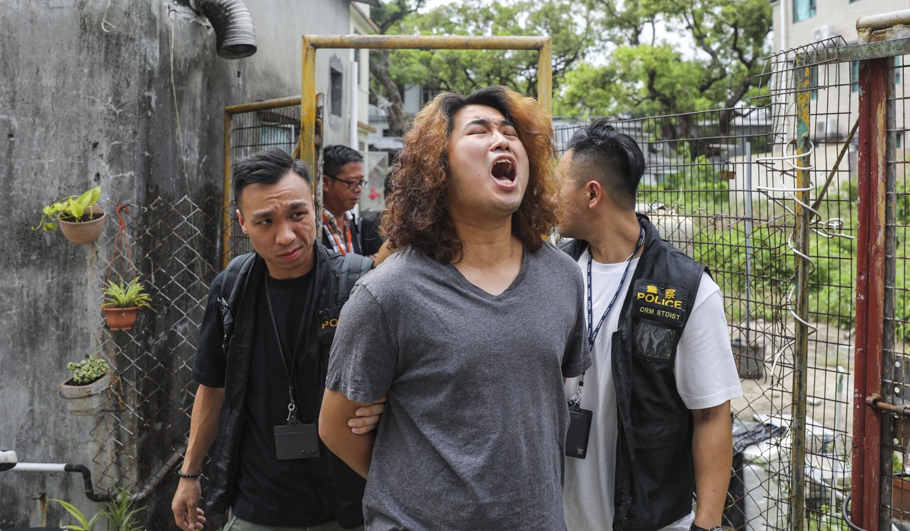 Demosisto member William Liu (centre) was detained for more than 40 hours. Photo: Sam Tsang
