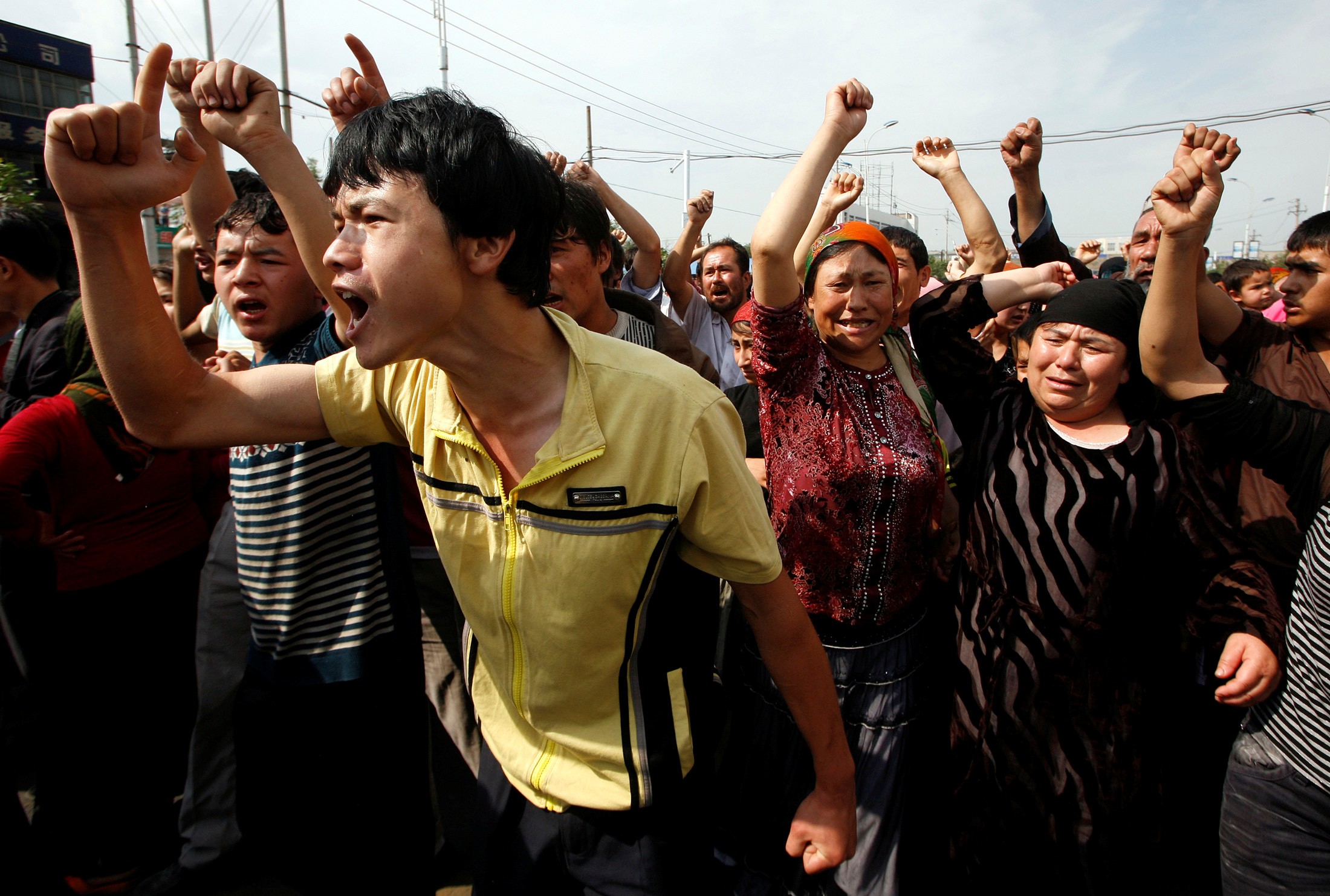 A crowd yells at Chinese police during a confrontation in Urumqi, Xinjiang, in 2009. China had declared itself a “victim of international terrorism” eight years earlier, helping “establish the narrative of a Uygur terrorist threat” in Xinjiang, writes Nick Holdstock in China’s Forgotten People: Xinjiang, Terror and the Chinese State. Photo: Reuters