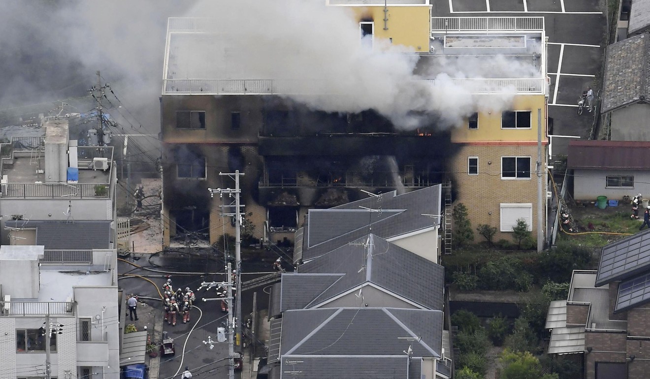 Smoke billows from the Kyoto Animation building. Photo: Kyodo