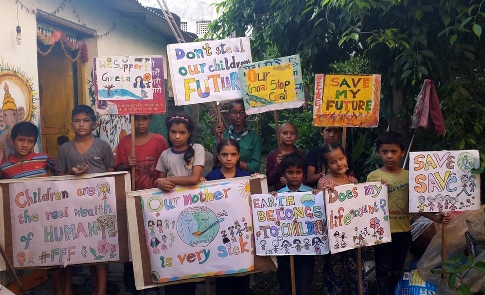 Children in Nepal protest against climate change.