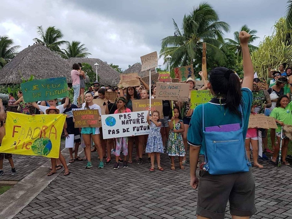 People in Tahiti strike against climate change.