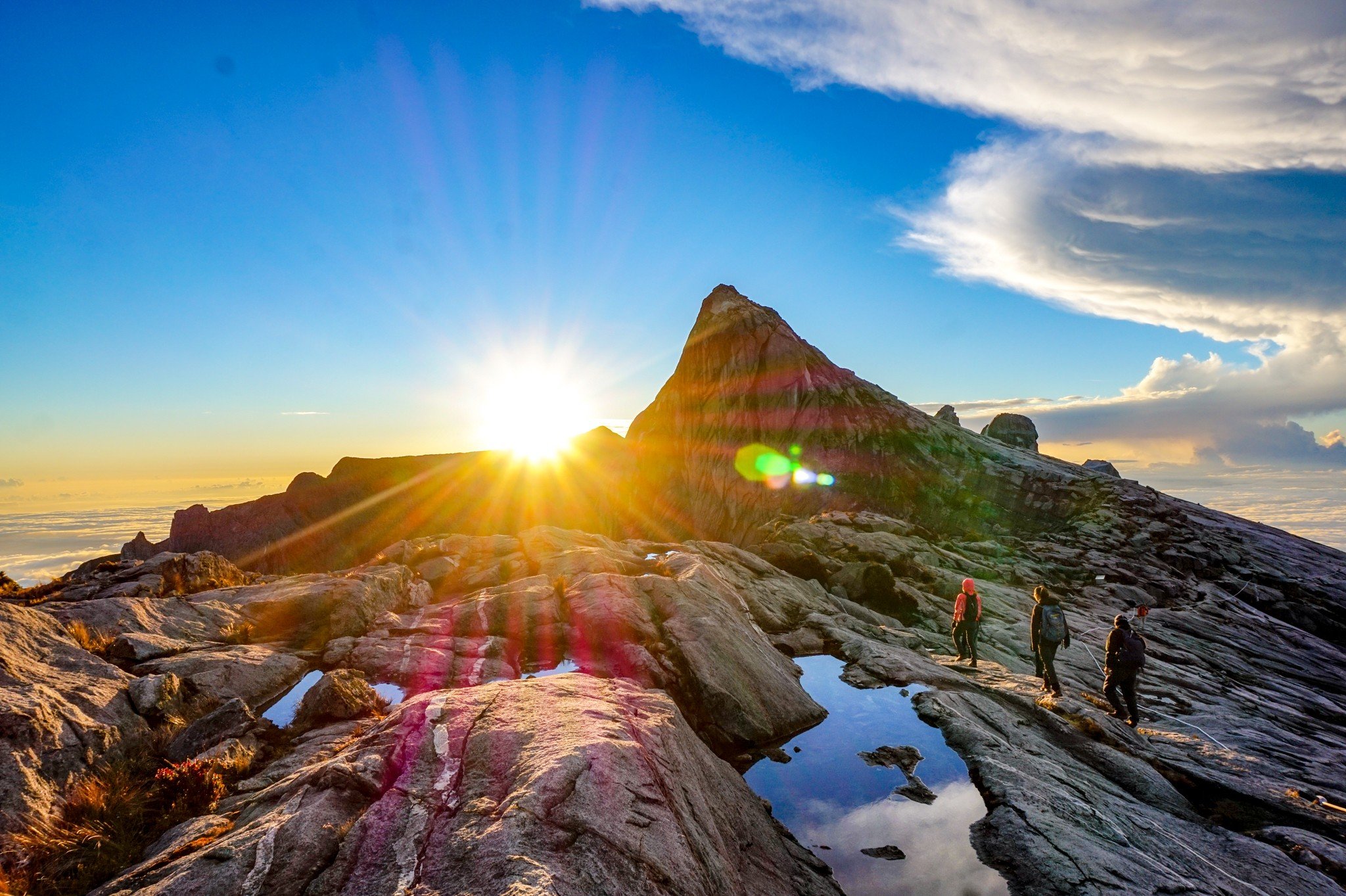 Sunrise above the rocky terrain of Malaysian Borneo’s Mount Kinabalu on the hike down from Low’s Peak. Photo: Nam Cheah