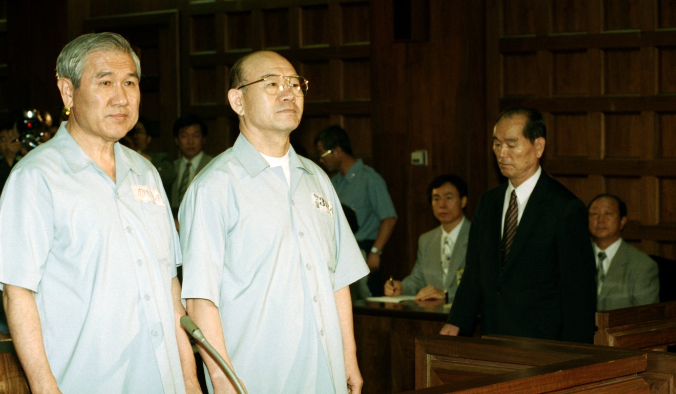 Former South Korean presidents Chun Doo-hwan (centre) and his successor Roh Tae-woo (left) in a 1996 trial for insurgency, graft and murder. The historic trial ended with Chun sentenced to death and Roh to a prison term of 22 years and six months, but the two were later pardoned. Photo: EPA