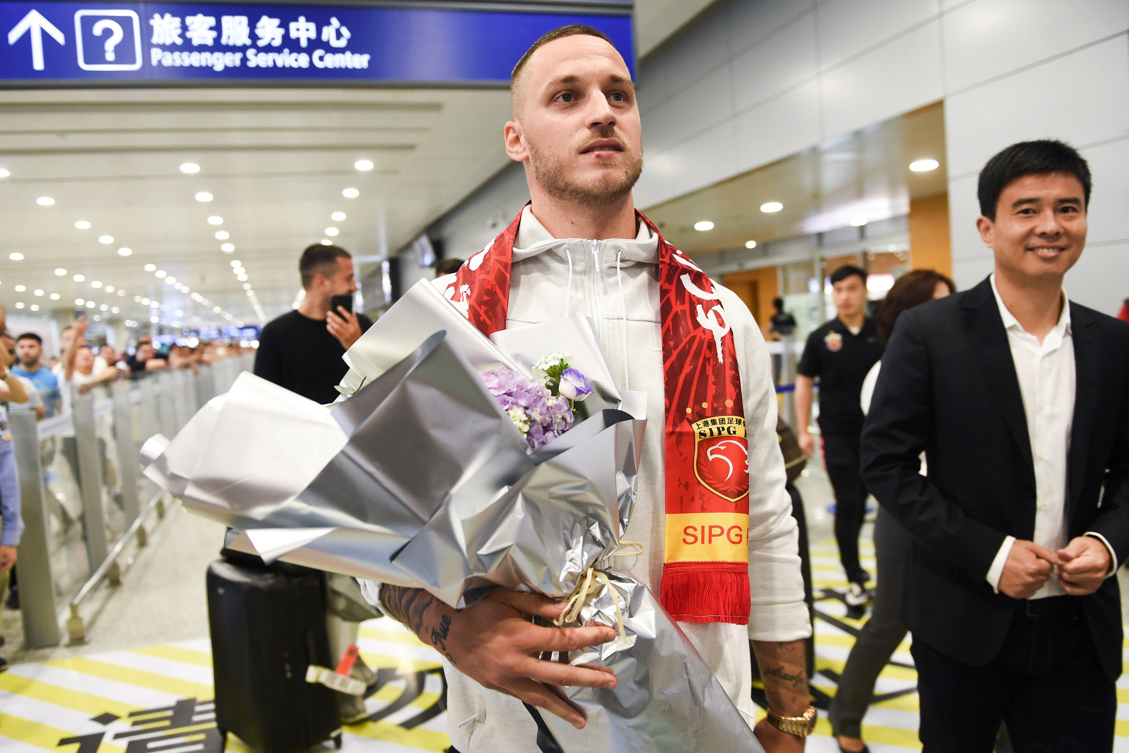 Marko Arnautovic arrives at Pudong International Airport after joining Chinese club Shanghai SIPG earlier this month. Photo: Reuters