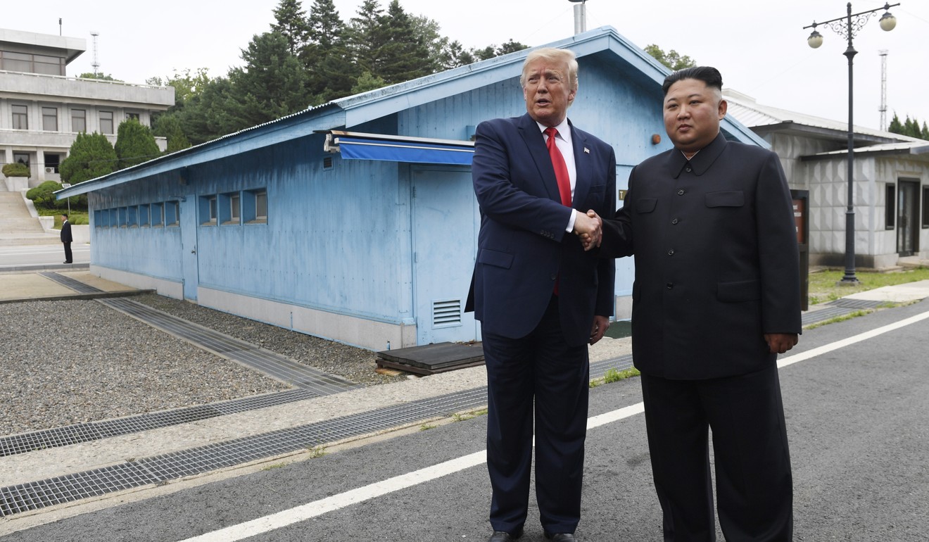 US President Donald Trump meets with North Korean leader Kim Jong-un in the demilitarised zone on June 30. Photo: AP