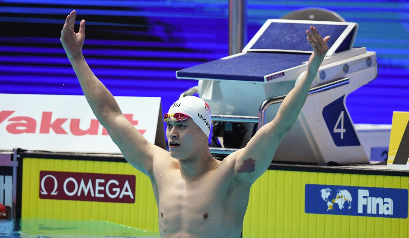 Sun Yang reacts after winning the final of the men's 200m freestyle event. Photo: AFP