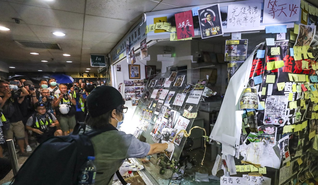 Protesters smash up Junius Ho’s office in Tsuen Wan. Photo: Sam Tsang