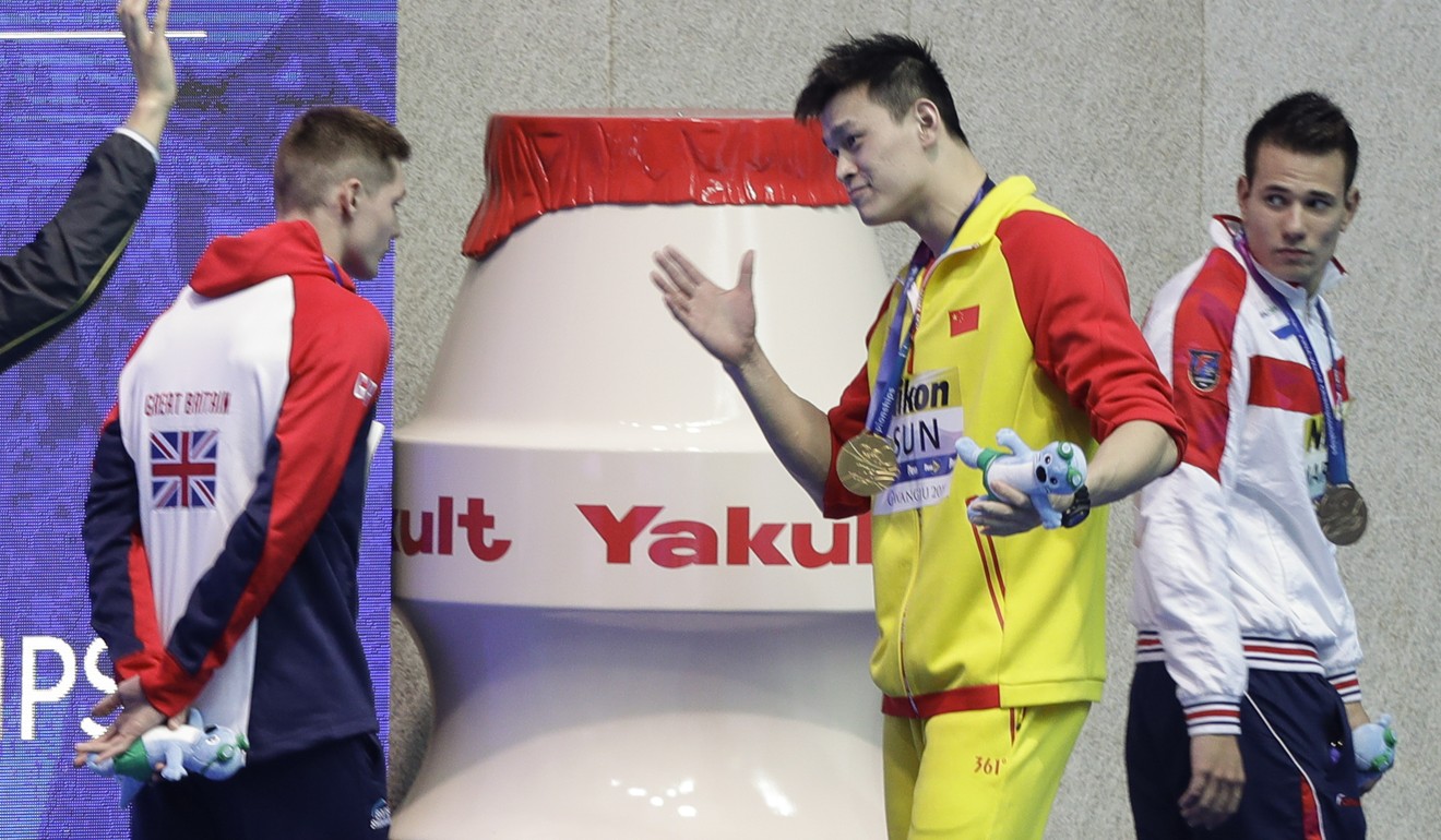 China’s Sun Yang goes to shake hands with Britain’s Duncan Scott following the medal ceremony in the men’s 200 metres freestyle final. Photo: AP