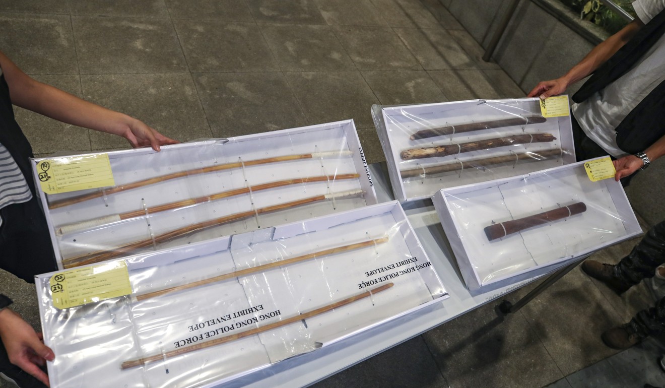 Police seized sticks and batons from the attacks on Sunday night. Photo: Winson Wong