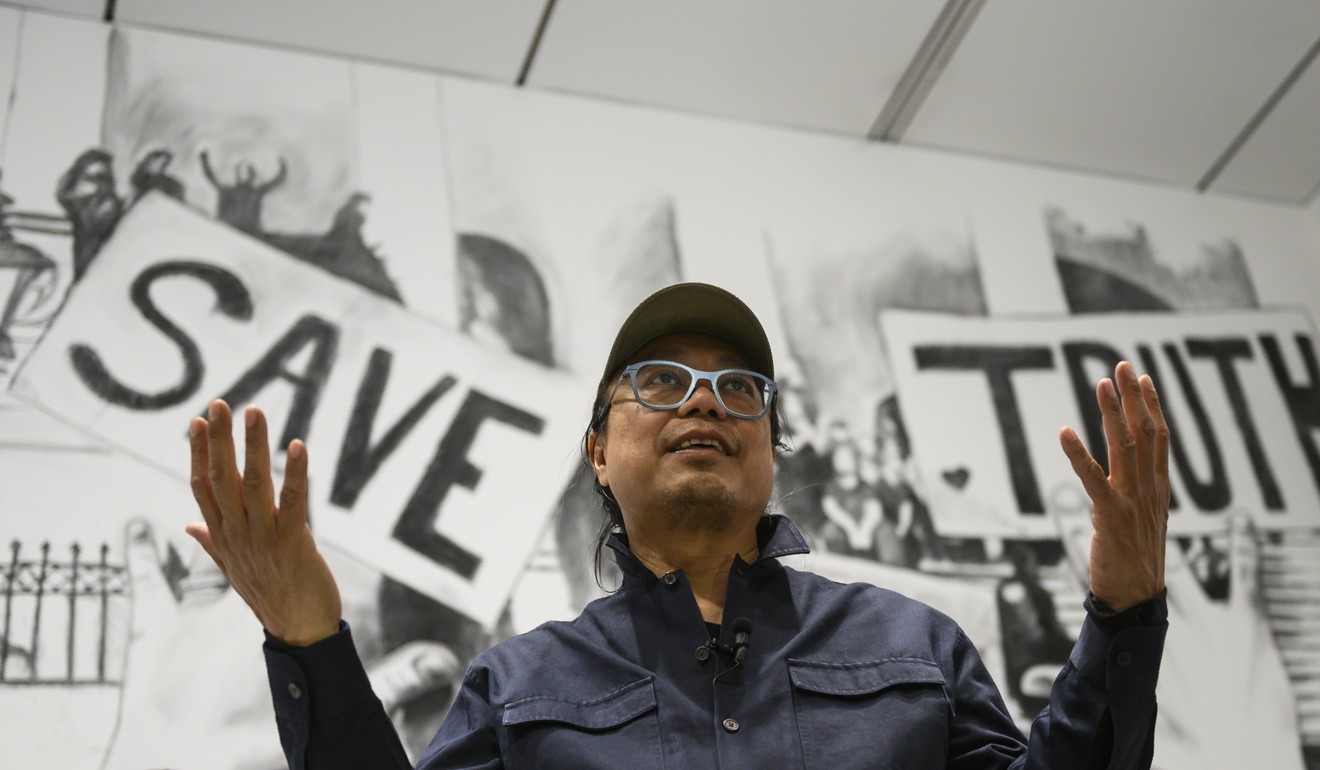 Thai artist Rirkrit Tiravanija at his interactive exhibit (who’s afraid of red, yellow, and green) at the Hirshhorn Museum in Washington. Photo: AFP